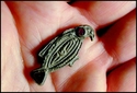 Thumbnail of Saltwood, brid brooch in hand