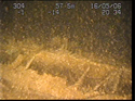 Thumbnail of Detail of aircraft; still from video