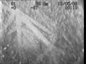 Thumbnail of Side view of engine assembly and mounting of engine 1, photomosaic image 4; still from video