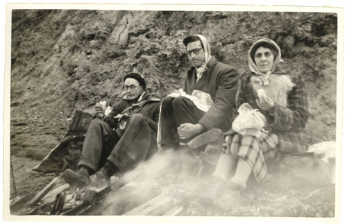 John Wymer and parents eating lunch in the snow